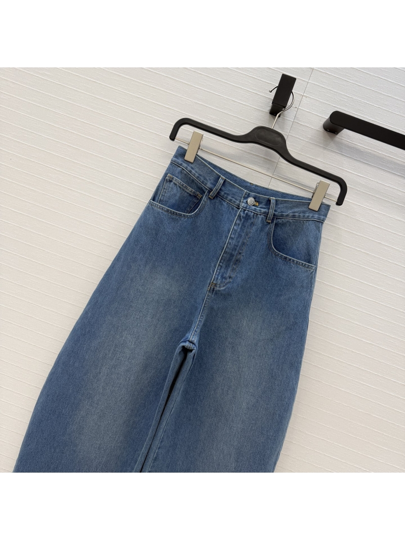 Alaia Signature Cloud Water Blue Washed Denim Jeans | High-Waist Curved Silhouette