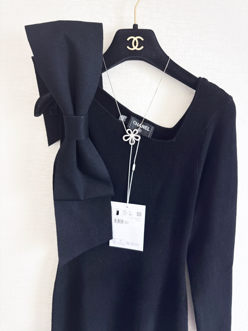 Chanel Asymmetric Bow Detail Black Wool Knit Dress | Sculptural Bow, Ribbed Texture, Flattering Fit