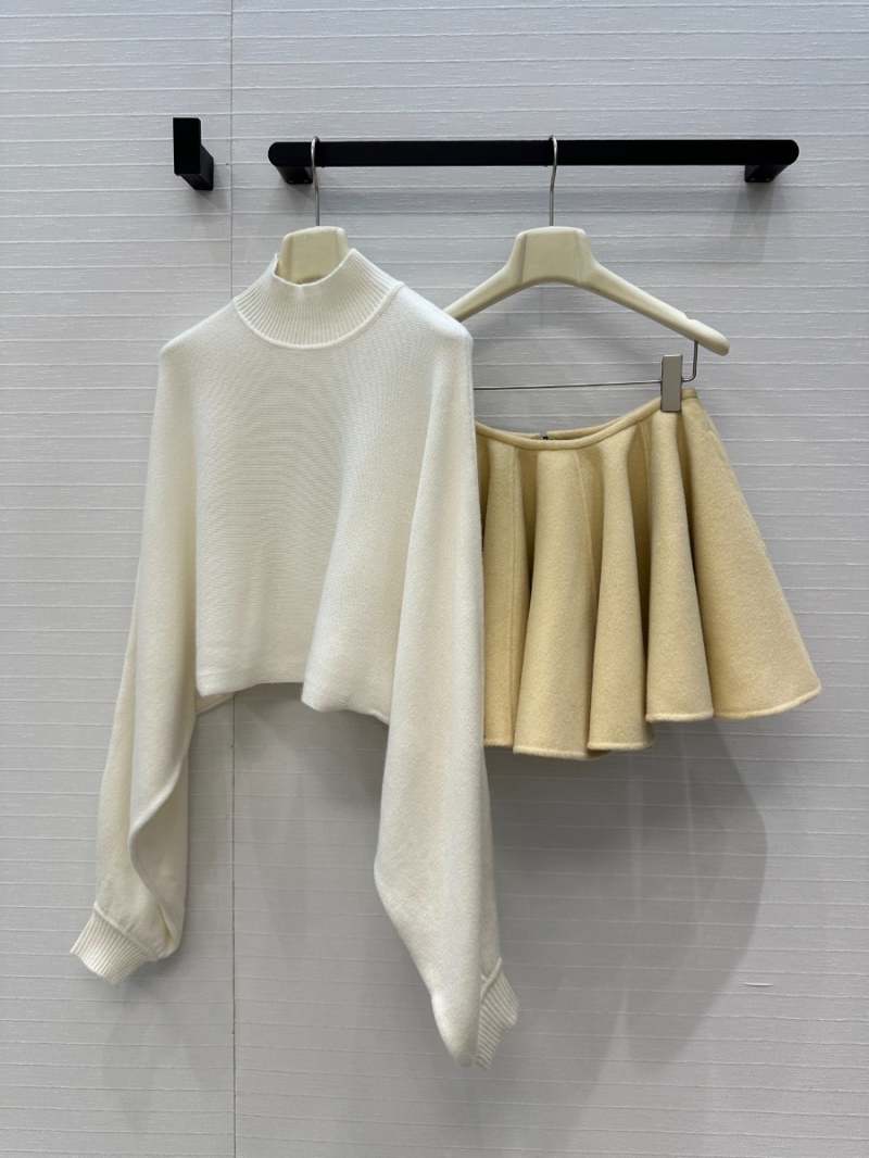 ALAIA Luxe Batwing Sleeve Wool Knit Crop Top in Cream