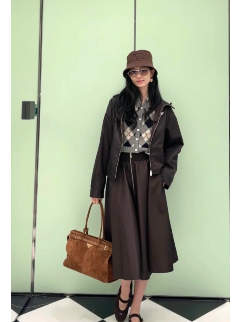 Prada Women's Short Hooded Nylon Puffer Jacket in Deep Plum — Signature Triangle Logo, Regenerated Nylon, Tailored Silhouette, Luxe Streetwear