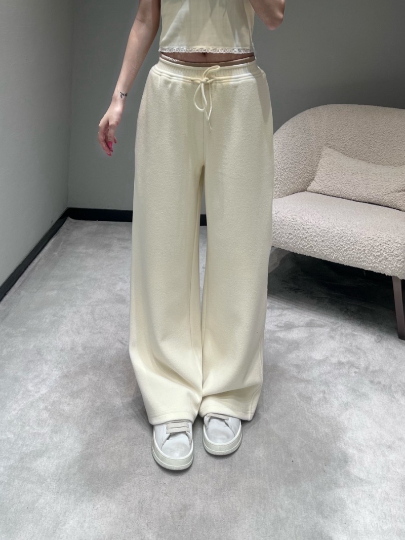 Miu Miu Off-White Wide-Leg Knit Pants - Luxurious Soft Jersey, Elastic Waist with Drawstring, Minimalist Chic Design