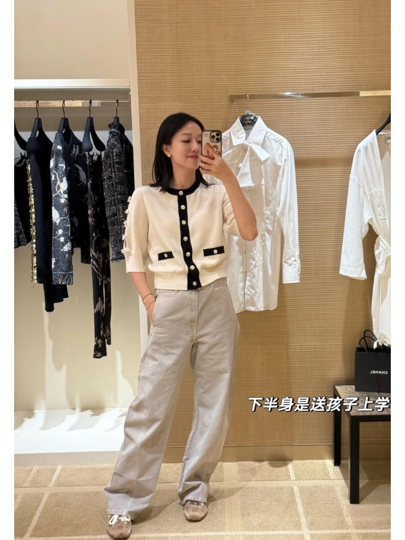 Chanel 3/4 Sleeve Bow Detail Knit Cardigan in Ivory with Black Trim - Chanel Logo Buttons, Pom Pom Accents