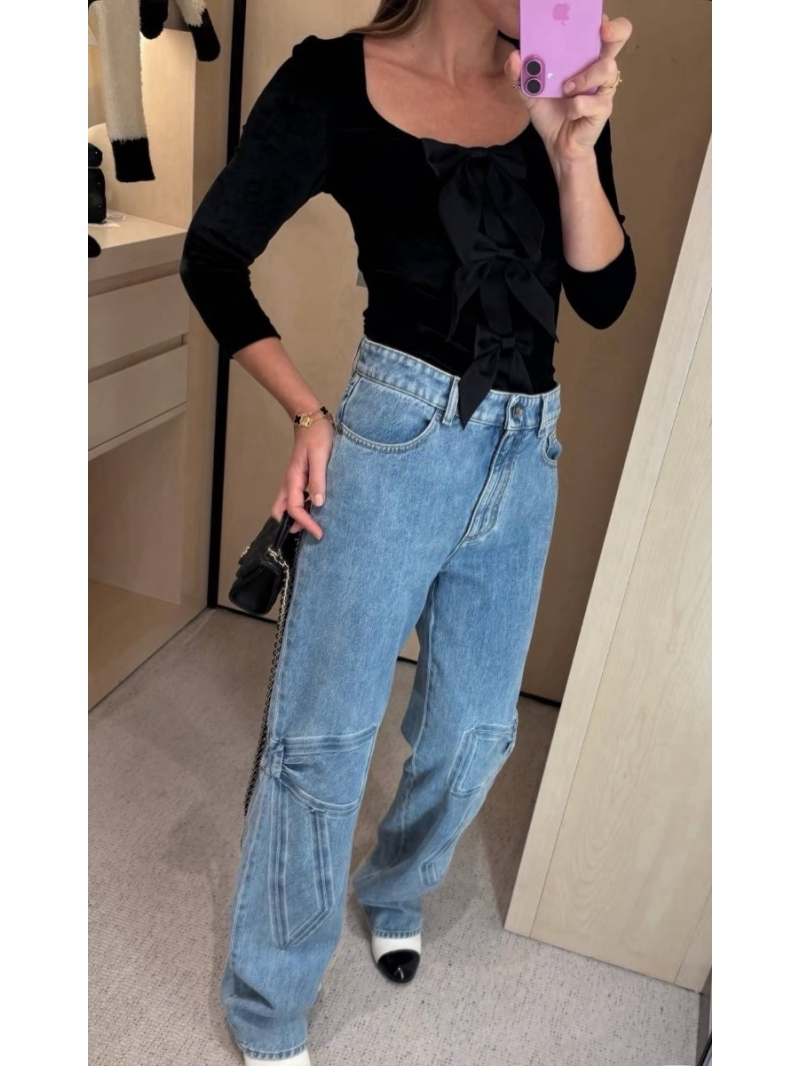 Chanel Coco Girl Cargo-Style Denim Pants – Sweet & Edgy Fashion Statement – Limited Edition Bow Detailing – Vintage Enzyme Wash