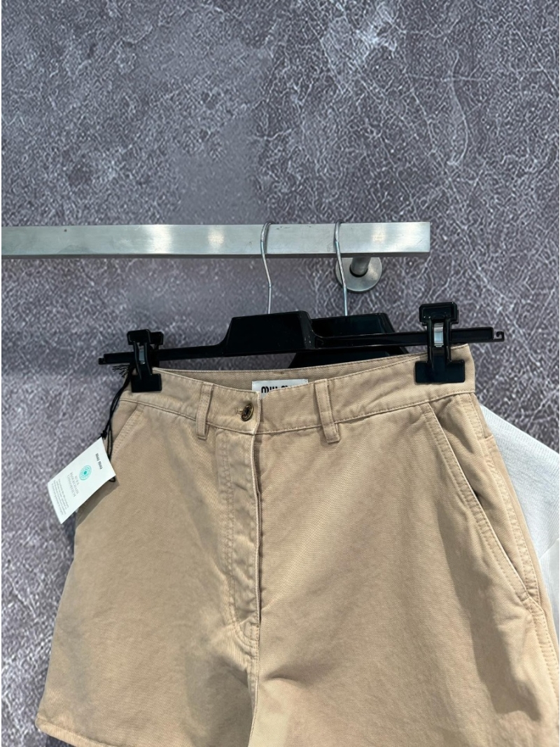 Miu Miu Distressed Denim Shorts in Khaki
