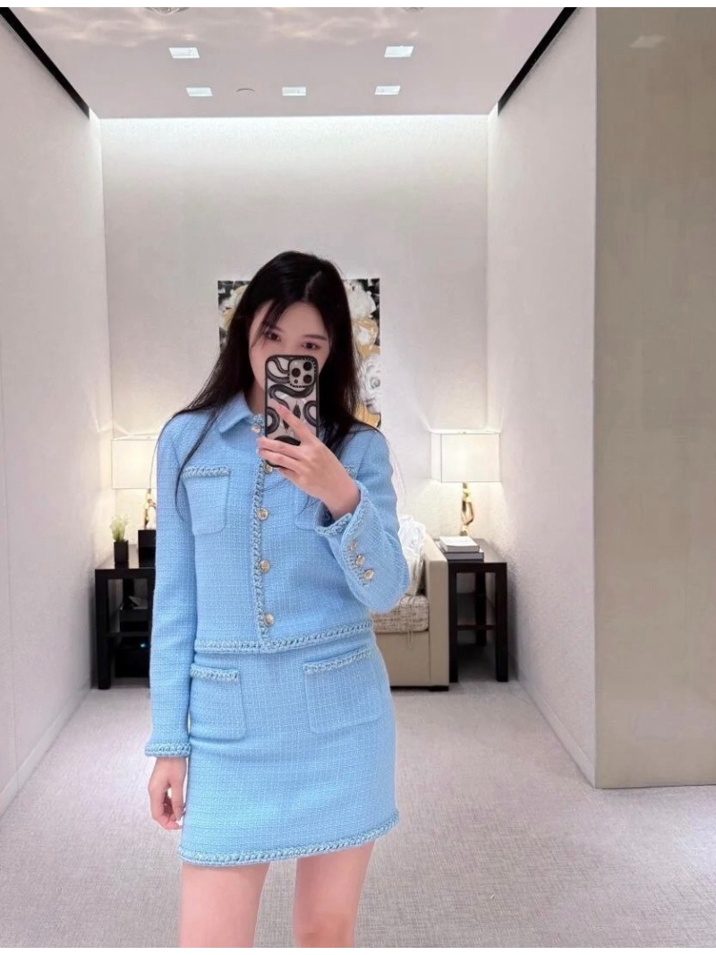 Chanel Women's Light Blue Tweed Mini Skirt, Exquisite Craftsmanship, Signature Metal Buttons, Couture-Inspired Pockets, Tailored Fit for Effortless French Elegance