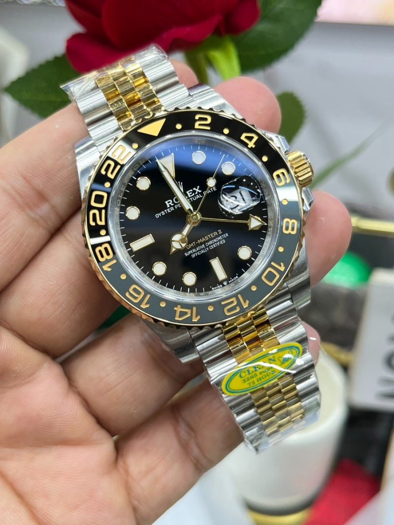 Rolex Oyster Perpetual GMT-Master II in Oystersteel with Black Dial 40mm and gold X silver Jubilee Bracelet