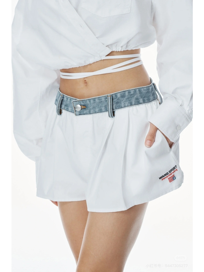 Alexander Wang Denim Fusion Chic Pleated Shorts in White.