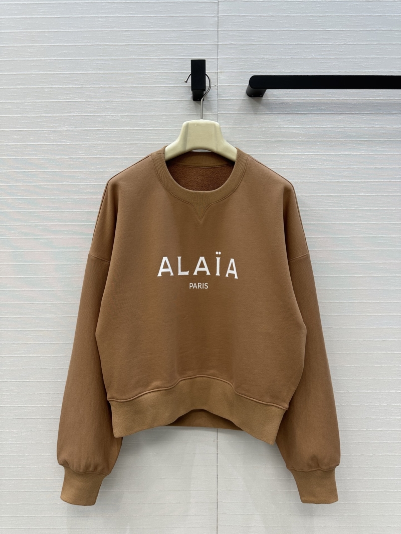Alaïa Cotton Cropped Logo Sweatshirt in Camel | Signature Ribbed Cuffs & Drop Shoulder