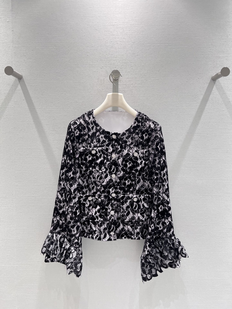 Chanel Elegant Long-Sleeved Lace Blouse in Black & White Floral Pattern with Pearl Buttons and Ruffled Cuffs