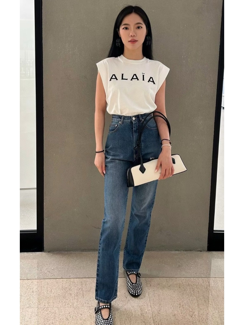 Alaia 25 New Collection: Asymmetric Cut Snow-Wash Wide-Leg Jeans with Structural Design