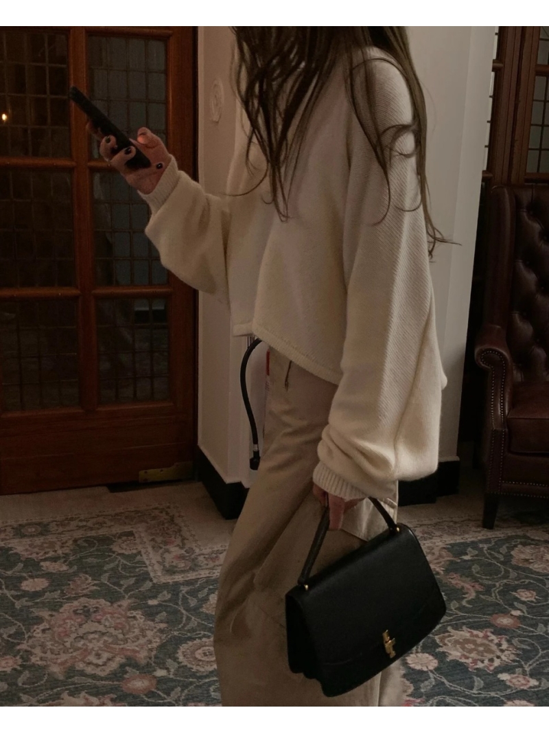 ALAIA Luxe Batwing Sleeve Wool Knit Crop Top in Cream