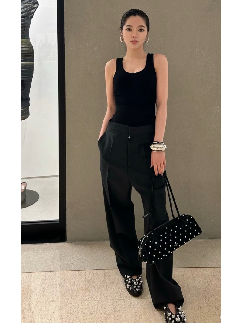 Alaia Deconstructed Knit-Blend Wide-Leg Trousers in Black | Exclusive Luxury Design