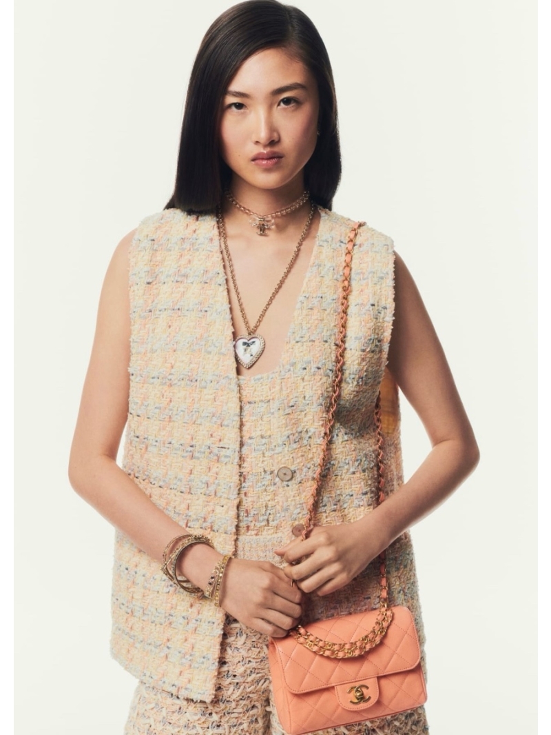 Chanel 25K Coco Girl Cream Tweed Vest – Elegance Redefined with Silk Lining