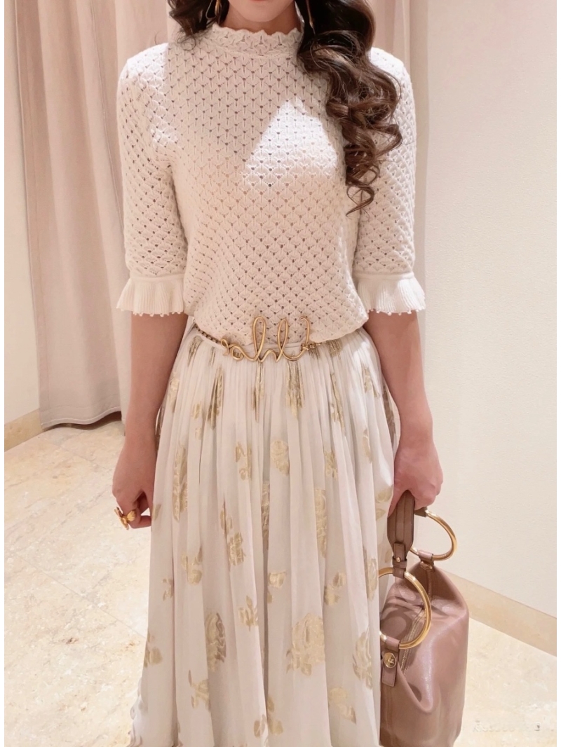 Chloe 18-Gauge Hollow Knit Wool Top with Ruffled Sleeves - Elegant & Luxurious