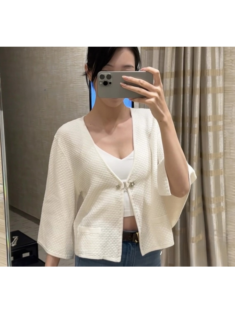 Chanel Spring 2025 Embossed Knit Hook Cardigan Ivory with Camellia Brooch