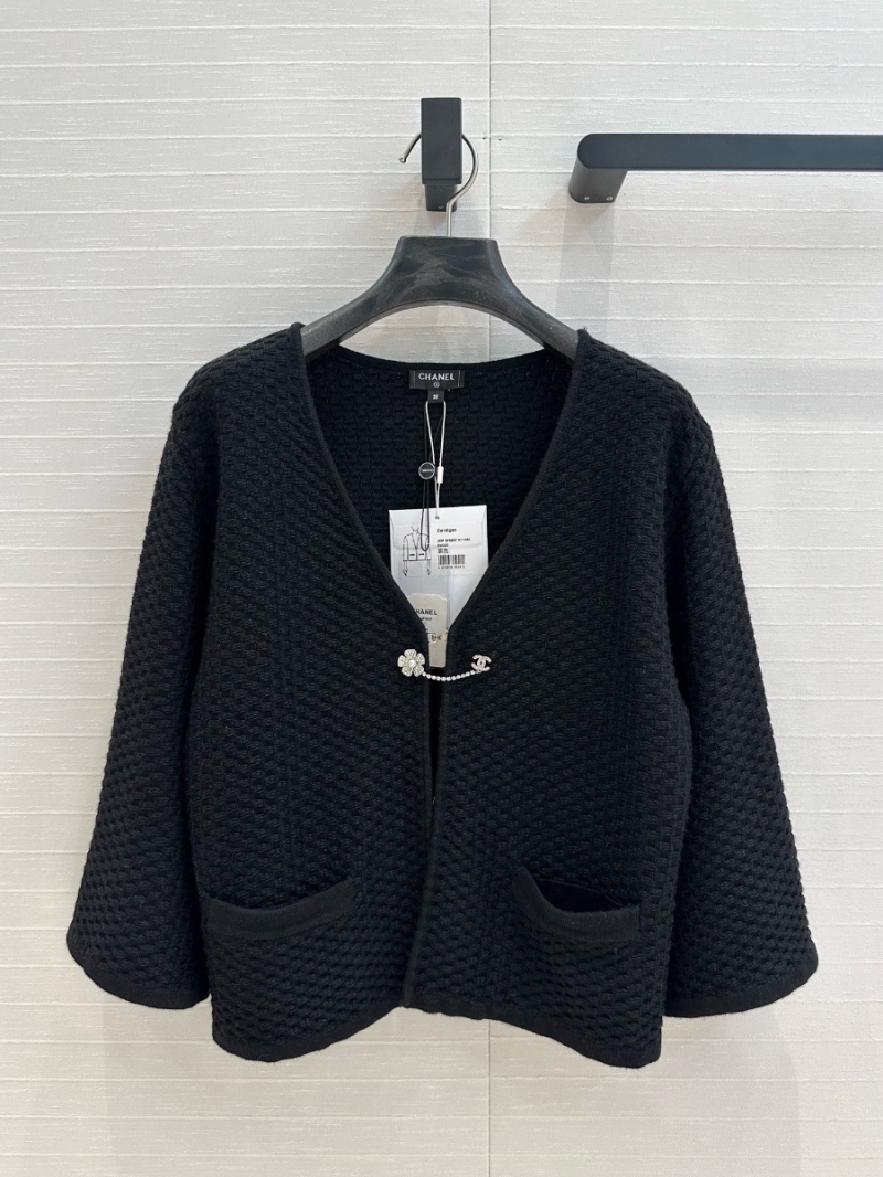 Chanel Spring 2025 Embossed Knit Hook Cardigan Black with Camellia Brooch