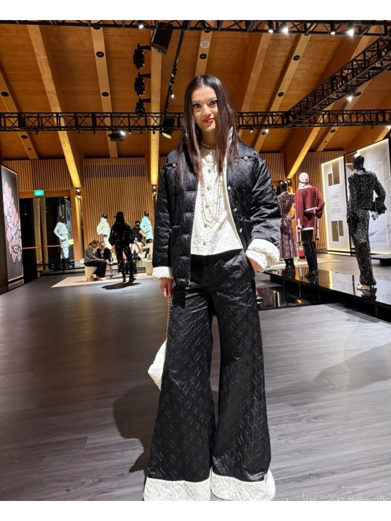 Chanel Luxe Black & White Silk Flared Pants - Exclusive Elegance