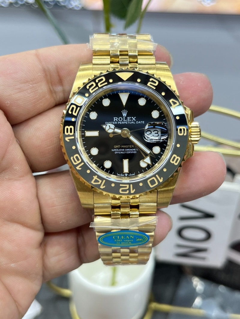 Rolex Oyster Perpetual GMT-Master II in Oystersteel with Black Dial 40mm and gold Jubilee Bracelet