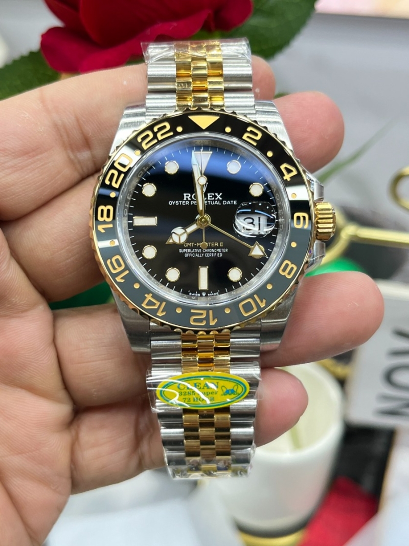 Rolex Oyster Perpetual GMT-Master II in Oystersteel with Black Dial 40mm and gold X silver Jubilee Bracelet
